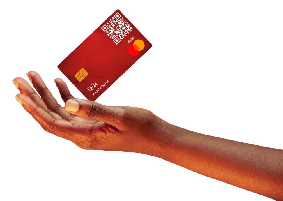 A hand holding a QR payment card