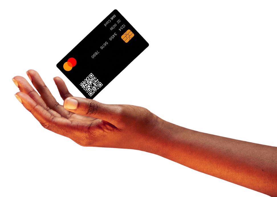 A hand holding a QR payment card